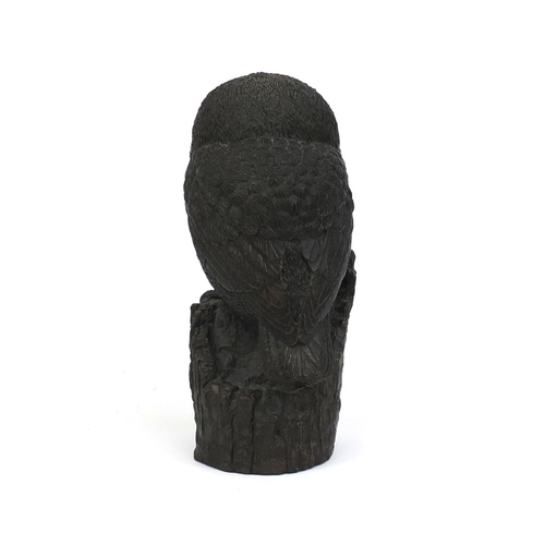 2240 - Bronze model of an owl perched on a tree trunk signed Dulk to the reverse, 21cm high