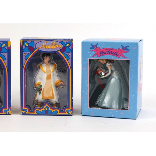 2360 - Four boxed Disney President edition polyresin decorations comprising Alladin, Jasmin, Cinderells and... 