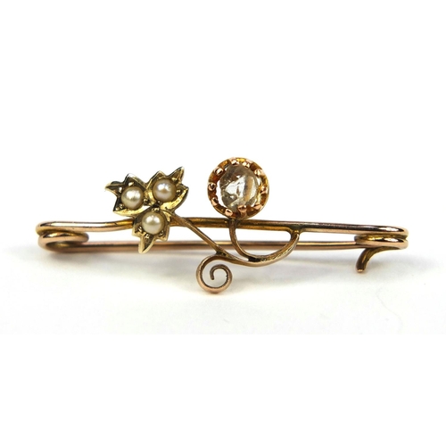 2631 - 9ct gold bar brooch set with seed pearls and a clear stone, 3.5cm long, approximate weight 1.4g