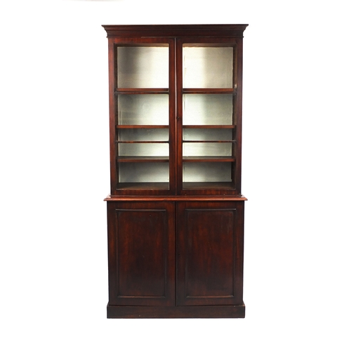 2010 - Victorian mahogany bookcase fitted with a pair of glazed doors enclosing three adjustable shelves ab... 