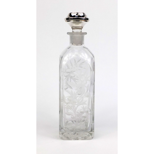 2130 - Two bottled Tantalus with silver stoppers and etched floral decoration, the stoppers hallmarked Birm... 