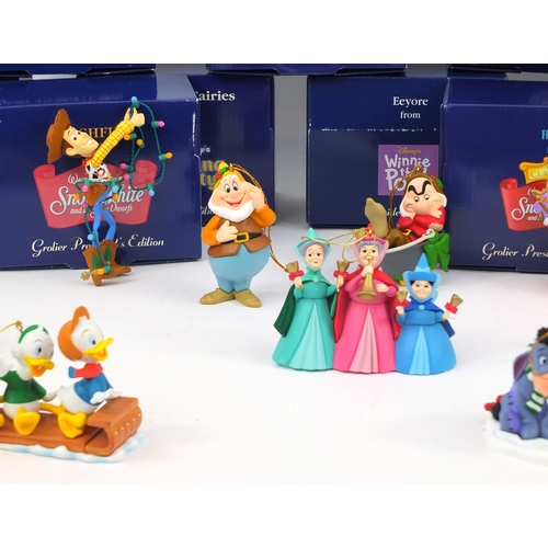 2359 - Sixteen boxed Disney President edition polyresin decorations including Snow White, Sleeping Beauty, ... 