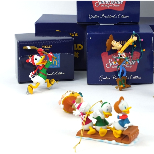 2359 - Sixteen boxed Disney President edition polyresin decorations including Snow White, Sleeping Beauty, ... 