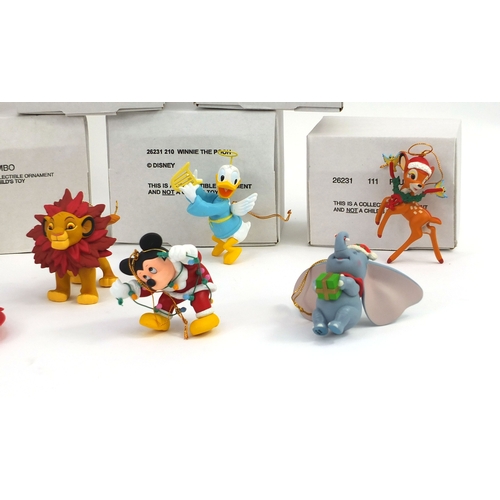 2356 - Fourteen boxed Disney President edition polyresin decorations including Goofy, Bambi, Donald Duck an... 