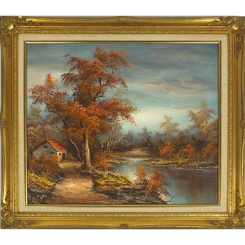 81 - Gilt framed signed oil on canvas of a tree lined lake and a cottage, 60cm x 50cm excluding the frame