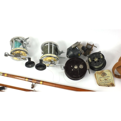 103 - Small selection of vintage fishing reels including a pair of Mitchell Garcia 624's and a Bakelite Al... 