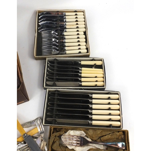 136 - Large selection of silver plated and stainless steel cutlery, some with ivorine handles including Sh... 