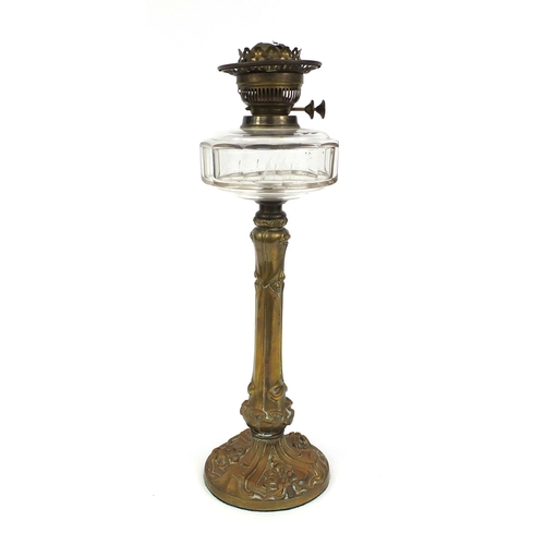 2231 - Art Nouveau brass oil lamp with brass column and base, decorated with stylised flowers, 52cm high