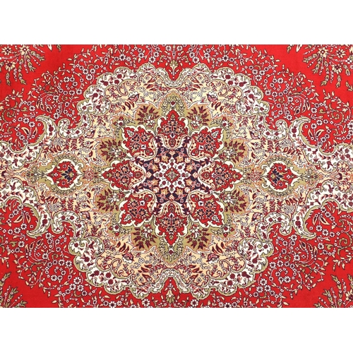 10A - Large red and cream ground floral rug, 300cm x 200cm