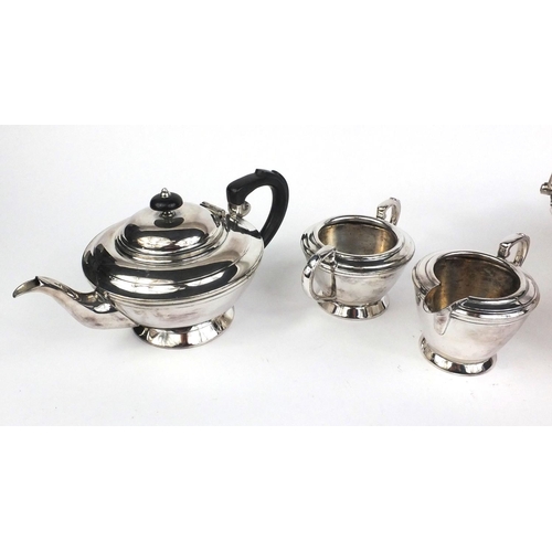 122 - T L & S silver plated three piece tea service, and a Hukin & Heath silver plated fruit basket with s... 