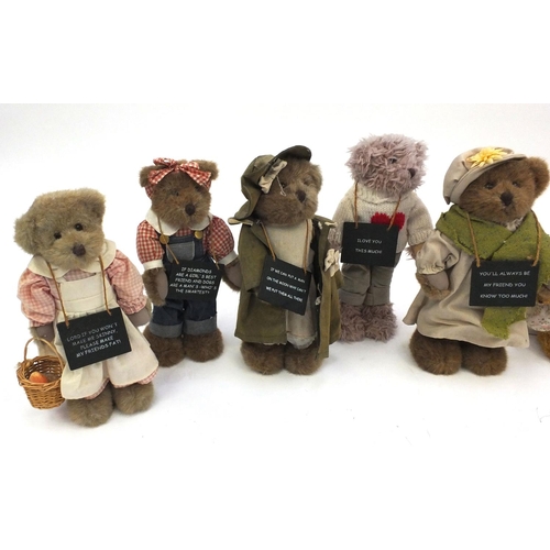 123 - Quantity of assorted teddy bears some with boards carrying a message, the bears approximate 30cm hig... 