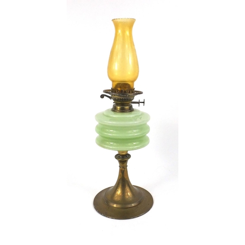 152 - Brass oil lamp with green glass reservoir, 55cm high