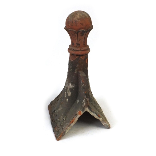 78 - Terracotta roof finial and a cast iron planter