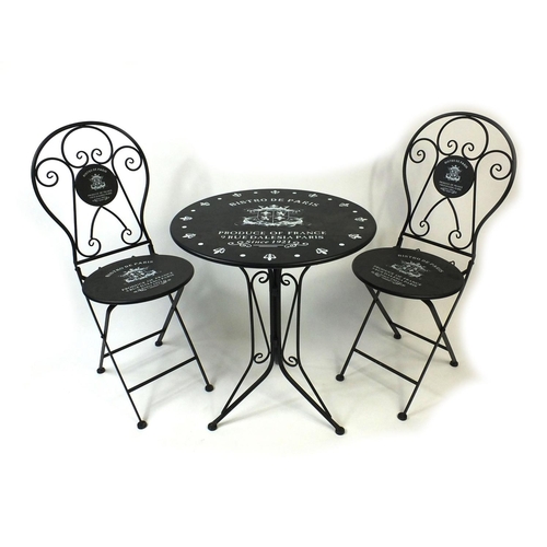 30 - Bistro De Paris metal table and two folding chairs, the table 75cm high x 61cm in diameter