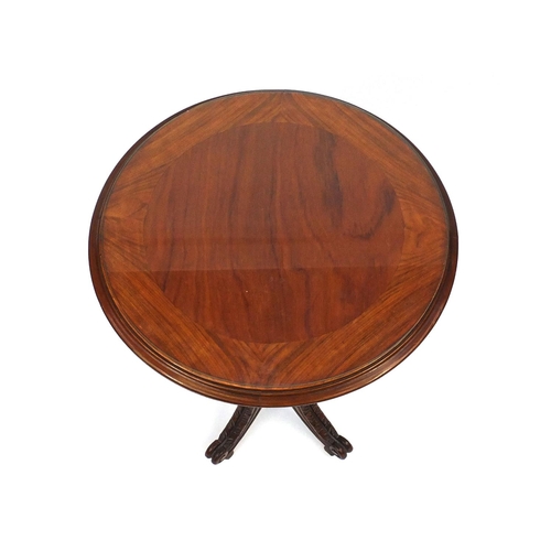 15 - Circular walnut occasional table, 70cm high