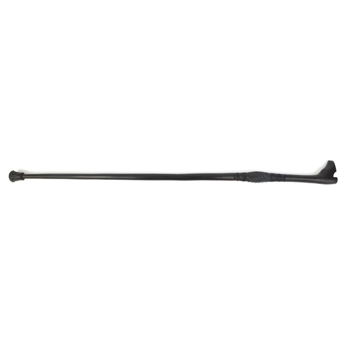 181 - Ebonised walking stick with carved handle in the form of a shoe, 87cm long