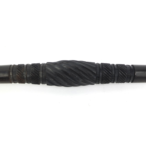 181 - Ebonised walking stick with carved handle in the form of a shoe, 87cm long