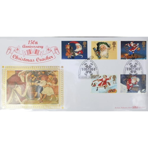 2750 - Four albums of predominately Benhams first day covers