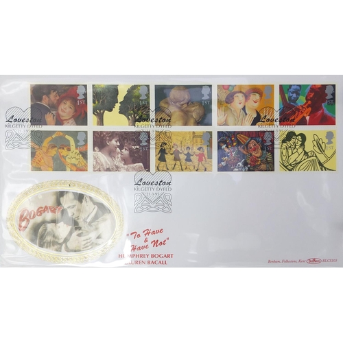 2750 - Four albums of predominately Benhams first day covers