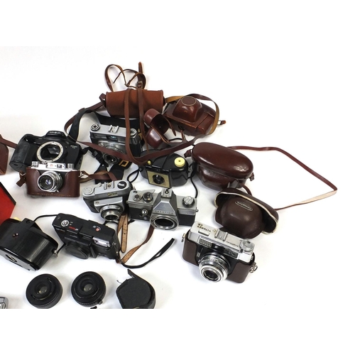 134 - Group of vintage cameras and accessories including Praktica, Bolex, Kodak and Minolta etc