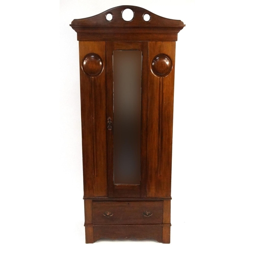 38 - Art Nouveau style single wardrobe with bevelled glass door, fitted with a drawer to the base, 208cm ... 
