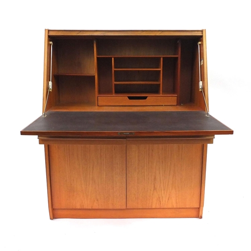 35A - Remploy teak bureau fitted with a fall above drawers and cupboard doors, 111cm high x 91cm wide x 41... 