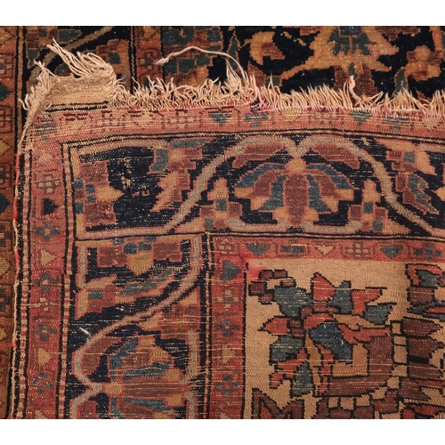 2008 - Antique rectangular North West Persian rug, the central field having an all over stylised floral des... 