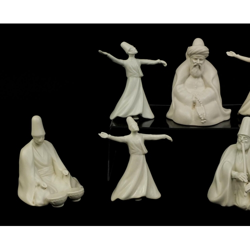 2094 - Group of Yildiz porcelain whirling Dervish figures, factory marks to the bases, the largest 13cm hig... 