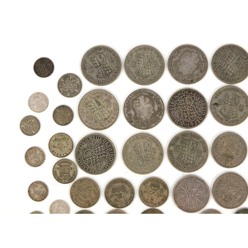 2431 - Group of British pre decimal coinage some silver examples including half crowns, three penny bit, sh... 