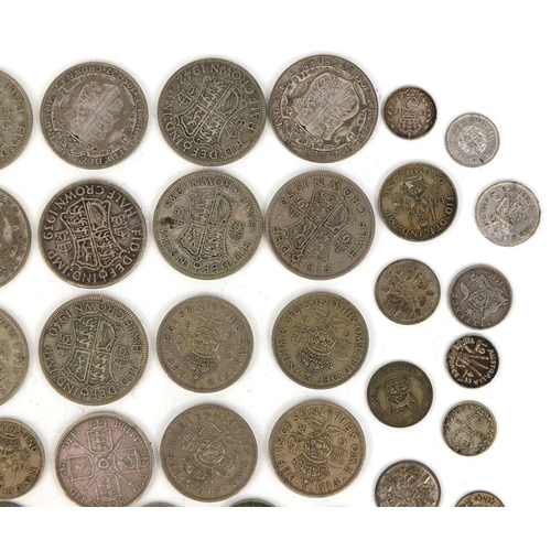 2431 - Group of British pre decimal coinage some silver examples including half crowns, three penny bit, sh... 