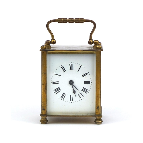 1100 - French brass cased miniature carriage clock with bevelled glass, enamelled dial and Roman numerals t... 