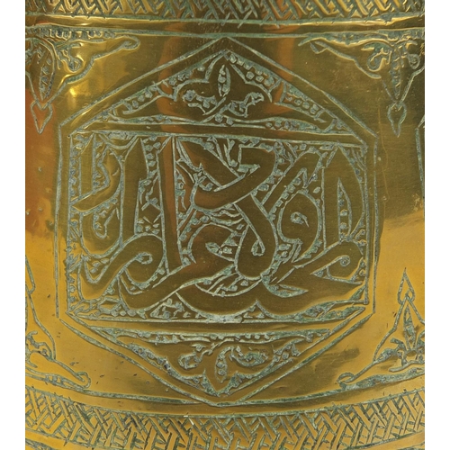 627 - Two Islamic Cairoware brass pots, both engraved with script, each 10cm high