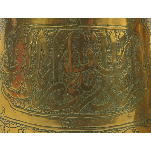 627 - Two Islamic Cairoware brass pots, both engraved with script, each 10cm high