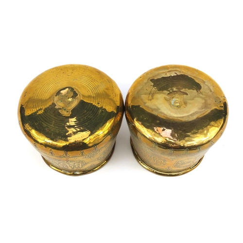 627 - Two Islamic Cairoware brass pots, both engraved with script, each 10cm high