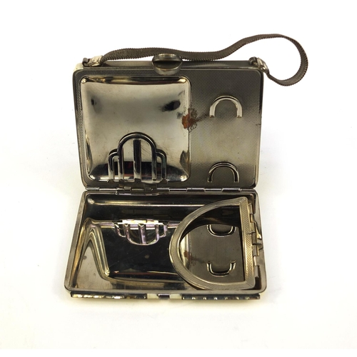 84 - Art Deco combination compact in the form of a handbag, 10cm wide