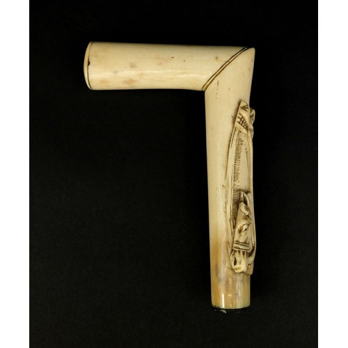 165 - Bone walking stick/crop handle carved with a dog and horse, 13.5cm high