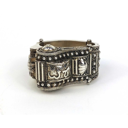 608 - Unmarked silver Islamic bangle, decorated with script, 7.2cm wide, approximate weight 127.0g