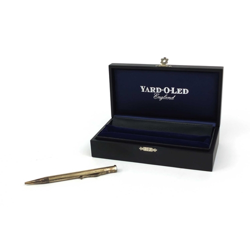 137 - Silver Yard-O-Led propelling pencil with engine turned decoration and box, 12.5cm in length