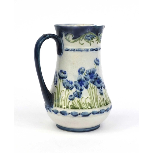 748 - Moorcroft McIntyre Florian ware pottery jug, hand painted and tube lined with poppies, factory marks... 