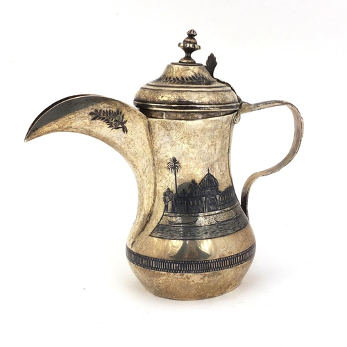 594 - Egyptian silver and niello work coffee pot, with a continuous band of river scenes, 17cm high, appro... 