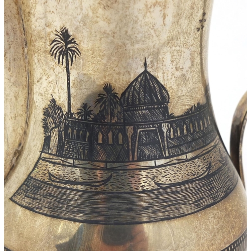 594 - Egyptian silver and niello work coffee pot, with a continuous band of river scenes, 17cm high, appro... 