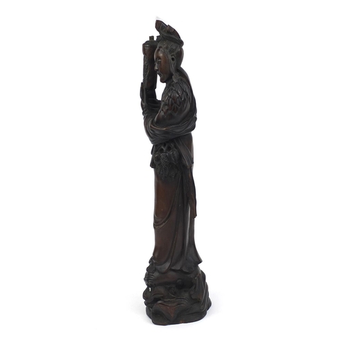 542 - Chinese root lamp base carved as a robed female standing upon a dragon, 52cm high