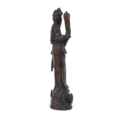 542 - Chinese root lamp base carved as a robed female standing upon a dragon, 52cm high