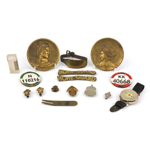 156 - Objects including Military badges, Dunhill silver plated lighter with engine turned decoration, cond... 