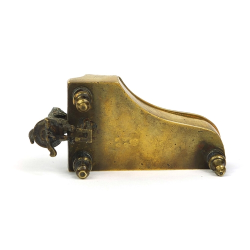 106 - 19th century cold painted bronze match striker, in the form of a cat playing a grand piano, the hing... 