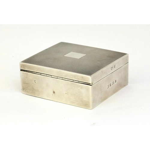 849 - Silver cigarette box, the hinged lid with engine turned decoration, indistinct makers mark, Birmingh... 