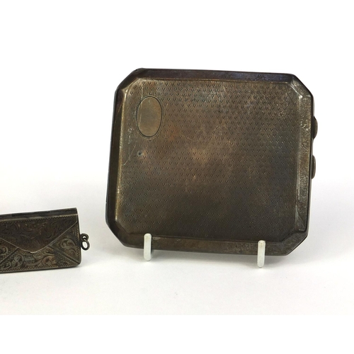 855 - Two rectangular silver cigarette cases with engine turned and chased decoration, and a silver double... 