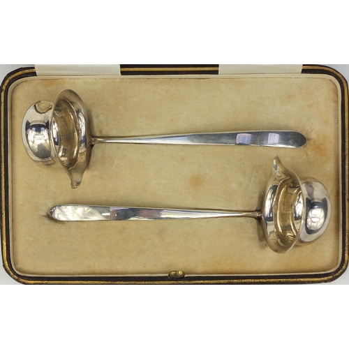 865 - Pair of silver sauce ladles, housed in a Terry & Co Manchester box, C B & S Sheffield 1929, 11.5cm l... 