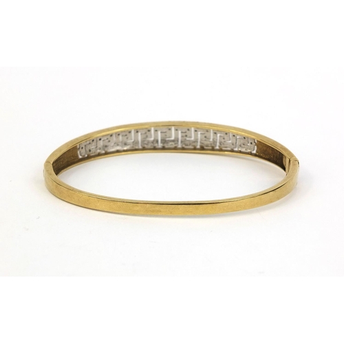 2442 - Unmarked gold diamond Greek key bangle, 7cm long, approximate weight 12.3g