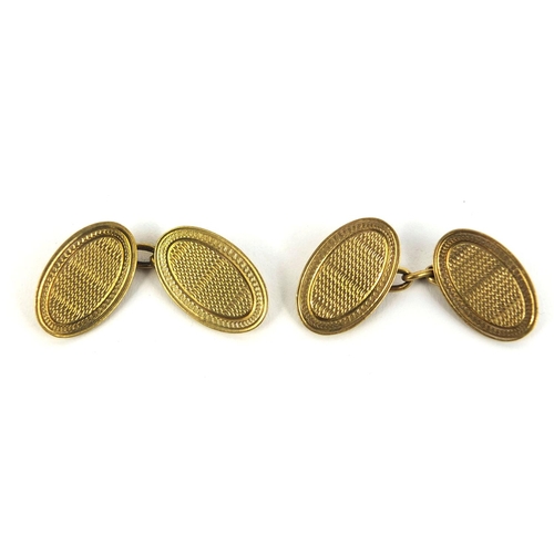 2443 - Pair of 9ct gold cufflinks with engine turned decoration, approximate weight 7.8g